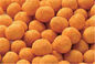 Желтым покрытый цветом пряный покрытый ингредиент шутих арахисов здоровый безопасный сырцовый