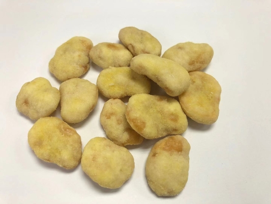 Хрустящий вкус меда и масла покрыл зажаренную широкую фасоль откалывает закуски